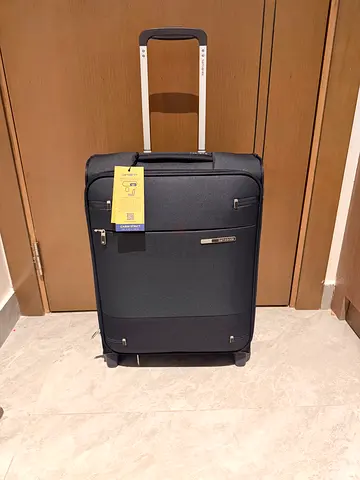 BRAND NEW Samsonite softside carry-on / small roller suitcase