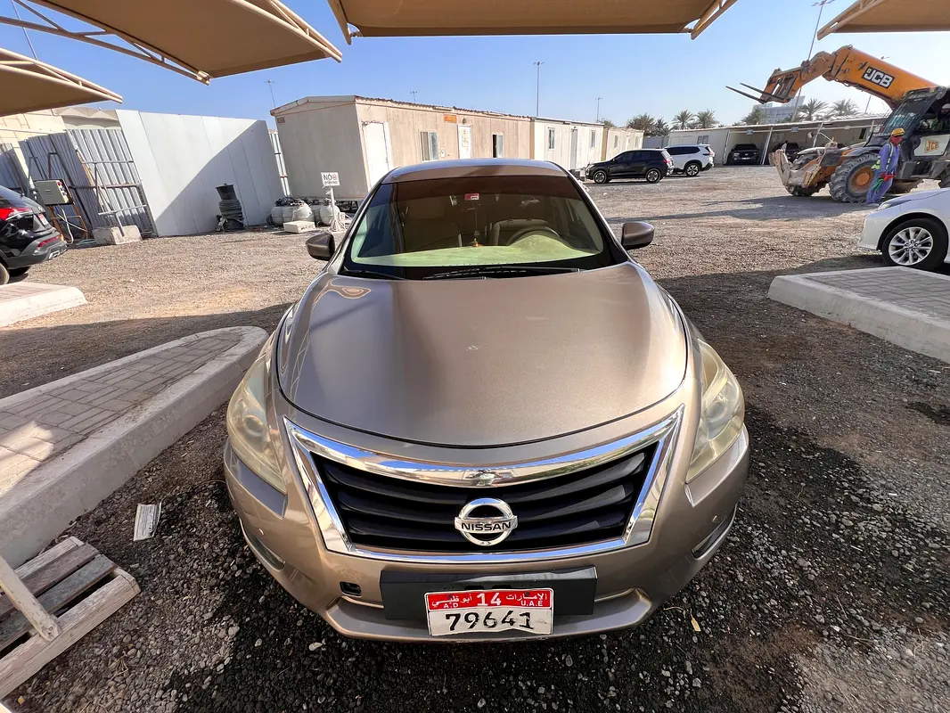 Nissan Altima 2014 — photo 1 of 14