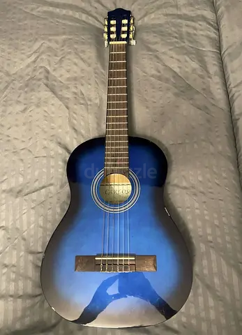 Blue acoustic guitar - used, good condition