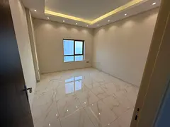 Two-bedroom apartment with a living room, Ajman Corniche, direct sea view, balcony, two bathrooms, s