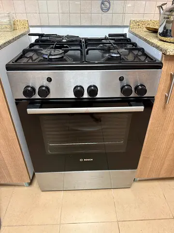 Bosch stainless steel gas cooker with oven - good working condition