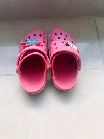 Pre-loved pink kids crocs-size 24/25