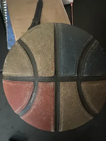 Used outdoor basketball — worn but playable