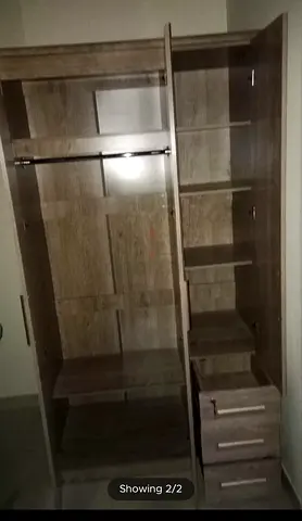 Slightly Used 3-Door Wooden Wardrobe with Shelves and Drawers