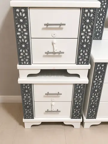MOVE OUT SALE Pair of white bedside cabinets with decorative grey panels — good condition