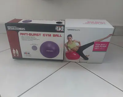 Two anti-burst gym exercise balls with pump - unused in boxes