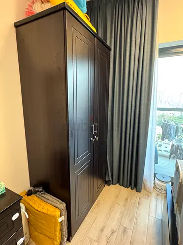Dark wooden 2-door wardrobe / armoire in good condition