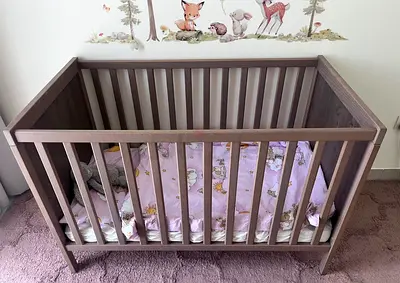 Solid wood baby crib / cot in good condition