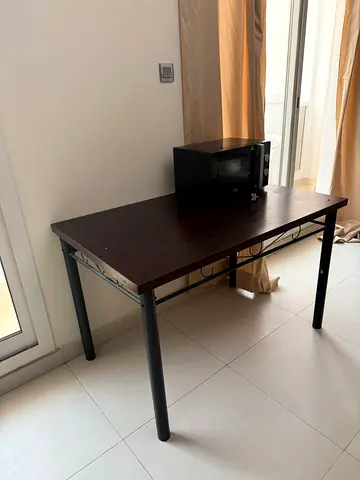 Simple dark wood dining/office table, Fridge, Oven, Cylinder