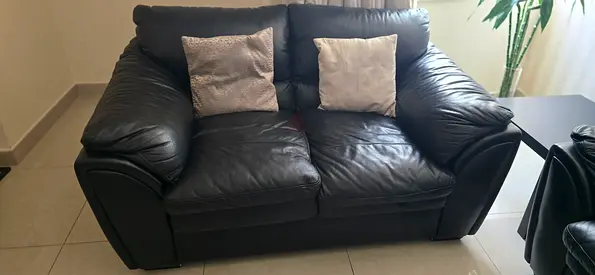 Black leather sofas in good condition, 2 seater + 3 seater + 2 seaters