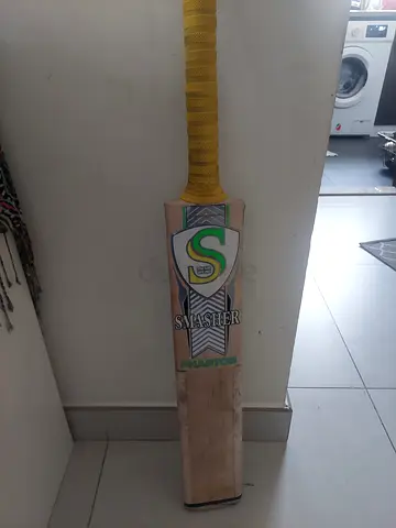 Used SS Slugger Cricket Bat with Grip - Good Condition