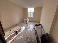 Al Nuaimiya 2 Ajman - Separate kitchen - Built-in wardrobes - Central air conditioning