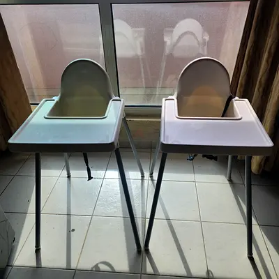 Pair of simple plastic high chairs for baby — used, clean