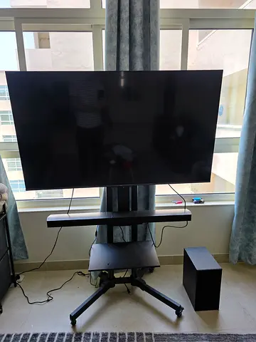Qled television TCL + Samsung Soundbar  sub + TV Stand combo