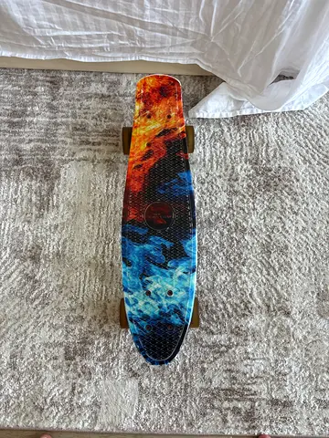 Colorful plastic cruiser skateboard / penny board - used