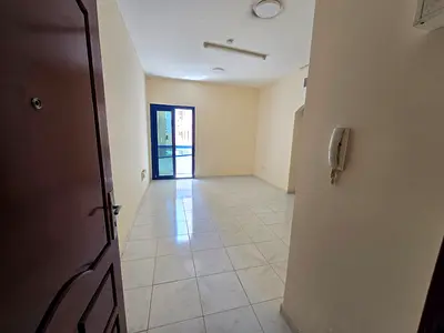 One BR Al Majara balcony spacious free parking central AC gas easy access Dubai Ajman.