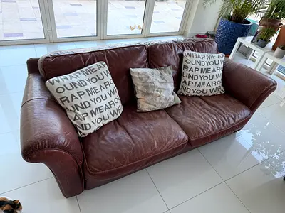 Brown leather 3-seater sofa — good condition