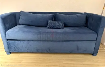 Super practical blue sofa bed