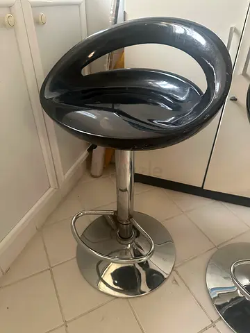 Pair of modern adjustable bar stools with chrome base
