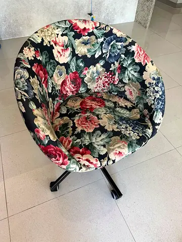 IKEA Floral Swivel Accent Chair — Comfortable Upholstered Seat on Black Base
