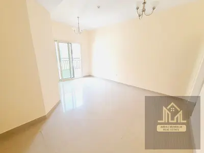 spacious apartment with two washroom balcony with parking prime location near muwaileh park