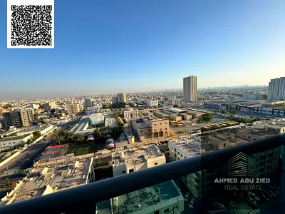 1BR apartment in City Tower Al Nuaimiya 3, master room, American kitchen, balcony, opposite Grand Mall, AED 28,000, 4 cheques.