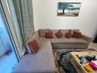 L-shaped fabric corner sofa with cushions - good condition