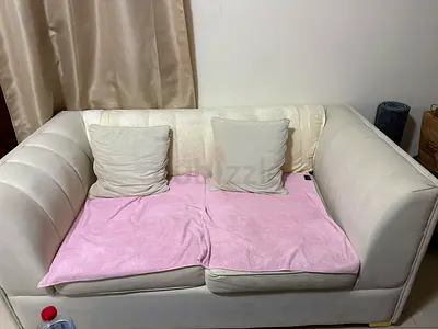 2-Seater Cream Fabric Sofa - Good Condition