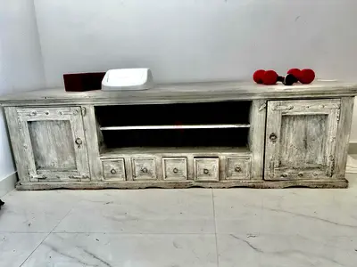 Furniture beautiful TV rack very expensive recently bought, been transferred to another country .