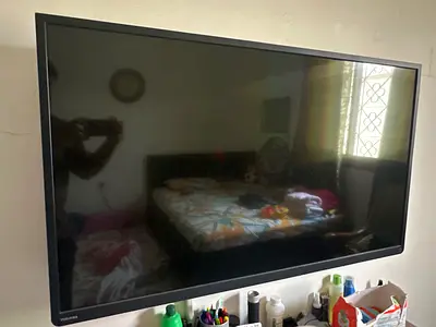 55 inch wall-mounted flat screen tv ( back light not working)