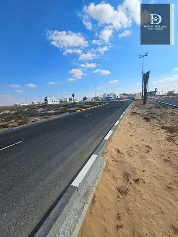 Prime Investment Land for Sale in Tilal City – Freehold for All Nationalities | Ground + 4 Floors +