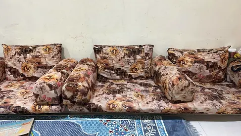 Low-seating sofa set with floral patterned cushions (4-piece)