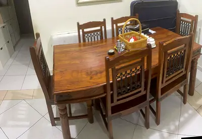 Solid Wood Dining Table with 6 Chairs - Good Condition
