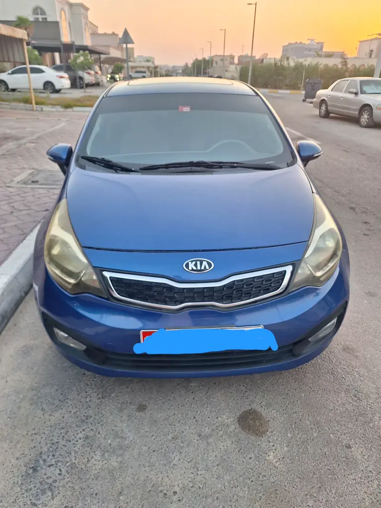 Kia Rio 2014 — photo 1 of 7