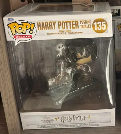 Funko Pop! Deluxe Harry Potter #135 – Harry Potter Pushing Trolley Vinyl Figure (In Box)
