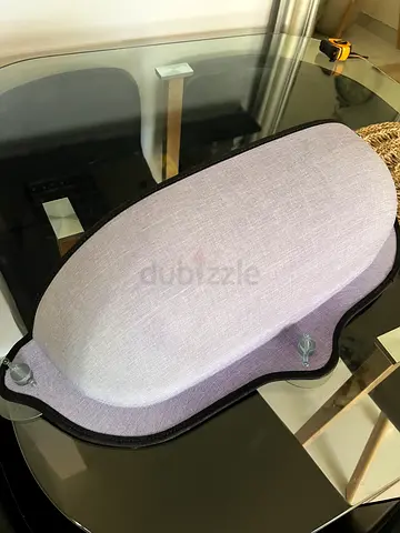 Grey window mounted cat bed with suction cups