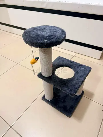 Small two-tier cat scratching post with perch and hideaway