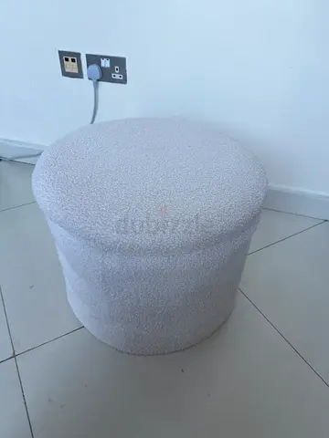 Small boucle ottoman / footstool in off-white