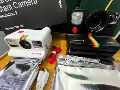 Polaroid camera Now+ And Polaroid go with film