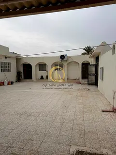 A house in Sabkha, Al-Raqa suburb, area of 8,000 square feet, prime location, third plot from the co