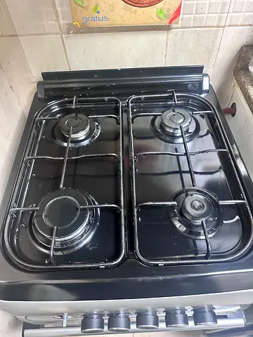 Used 4-Burner Gas Stove with Oven - Good Working Condition