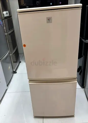 Sharp small fridge bottom freezer made in Japan exllent condition perfect working