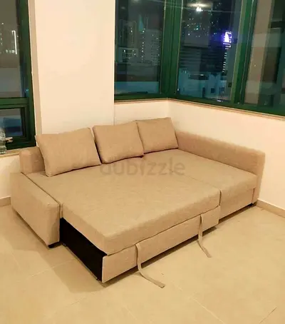 Ikea L Shape Sofa cum bed with big storage in L
