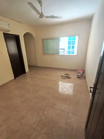 For rent in Sharjah, Al Manakh area. Two bedrooms, a living room, a hallway, and 2 bathrooms. Excel