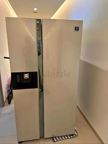 Used Side-by-Side Refrigerator with Water Dispenser - Good Condition