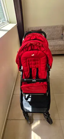 Red Joie lightweight stroller in good condition
