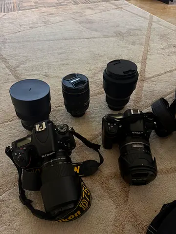 Collection of Nikon DSLR Cameras and Lenses