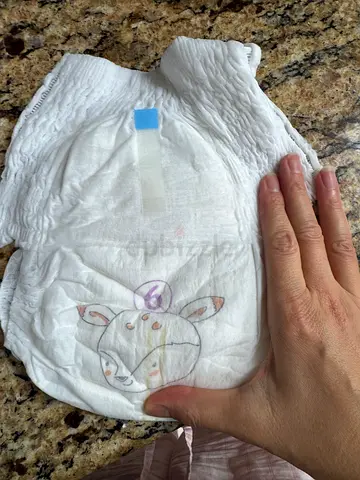 Gently used pull-up style baby diaper (single piece) size 6, 17pieces.