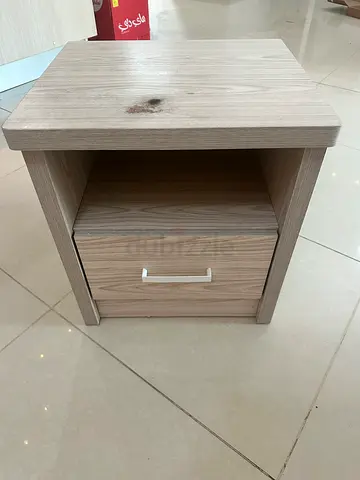 Light wood bedside table with single drawer and open shelf