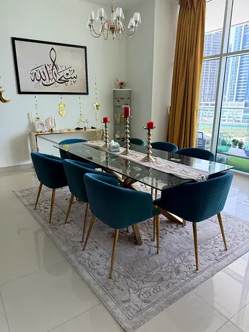Glass Top Dining Table with 6 Velvet Chairs - Light Grey Rug Included